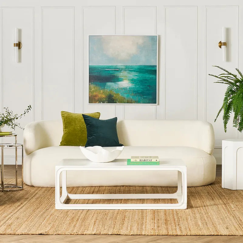 Coastal wall art in a luxury living room with ocean-inspired colours